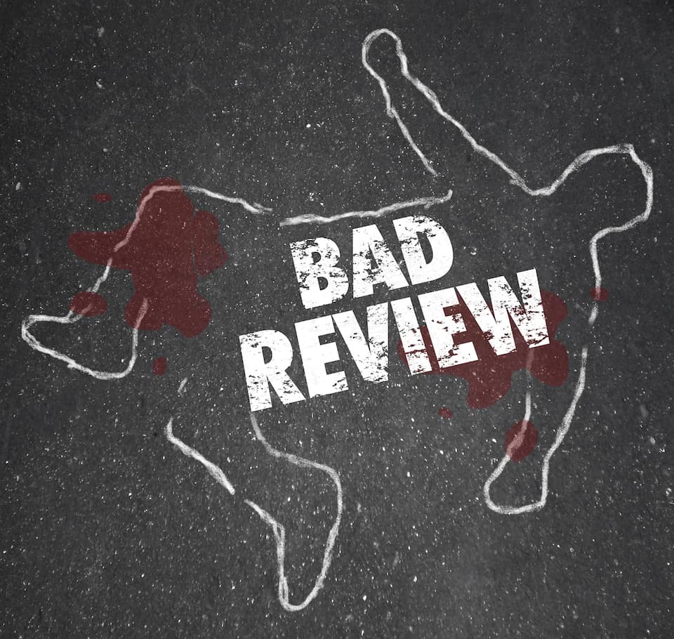 Chalk outline of body with “Bad Review” written